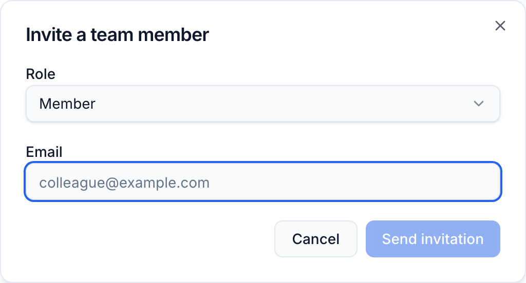 The Invite a team member dialog with a Role selector set to Member and an Email field